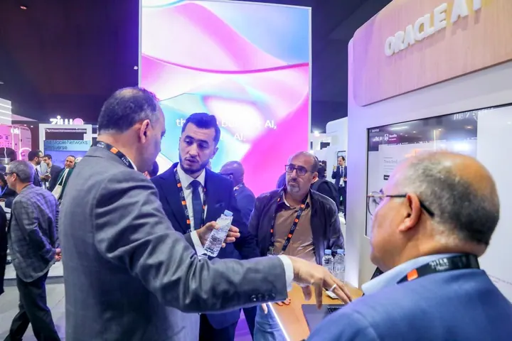 Briefing customers at the Oracle AI stand — Morocco